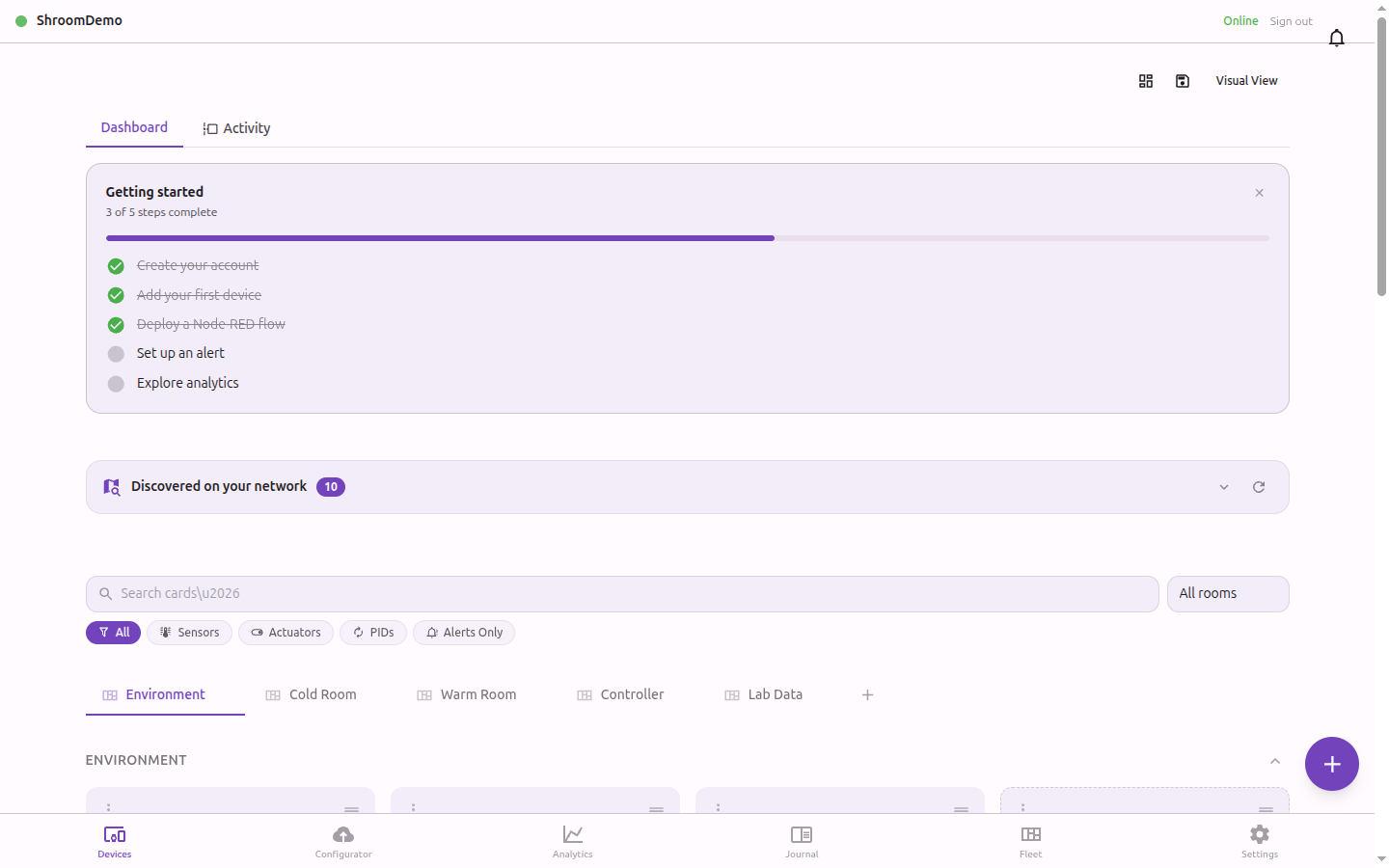 Live sensor dashboard showing room-based organization with sparklines and status indicators